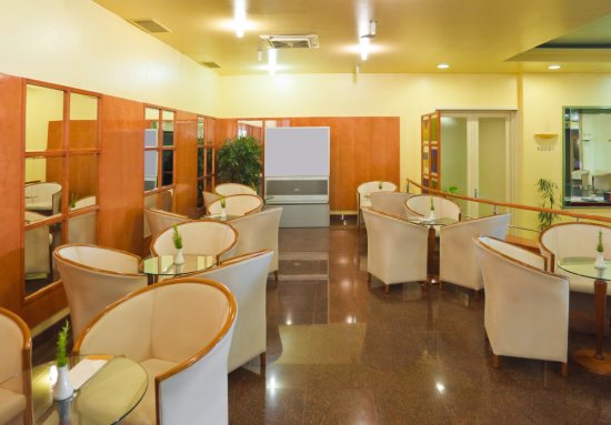 Mirrors Across Cafe Wall